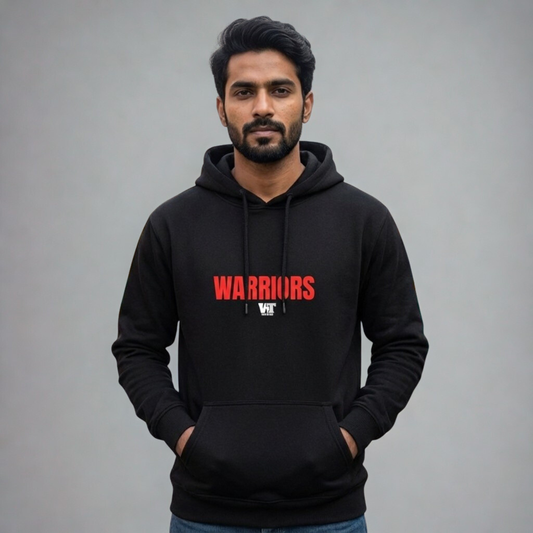 Model wearing black Ahom Warriors hoodie front design – We Tees