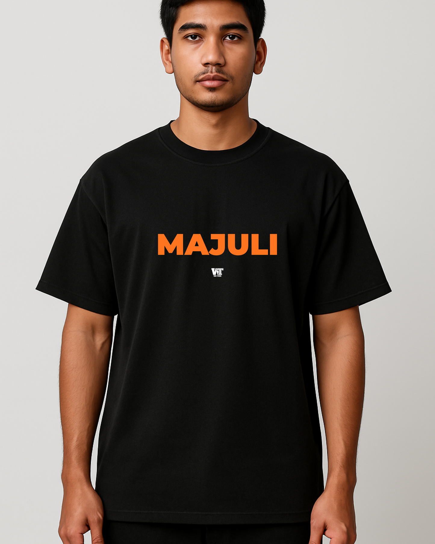 MAJULI printed oversized black T-shirt — WE TEES cultural streetwear front logo design.
