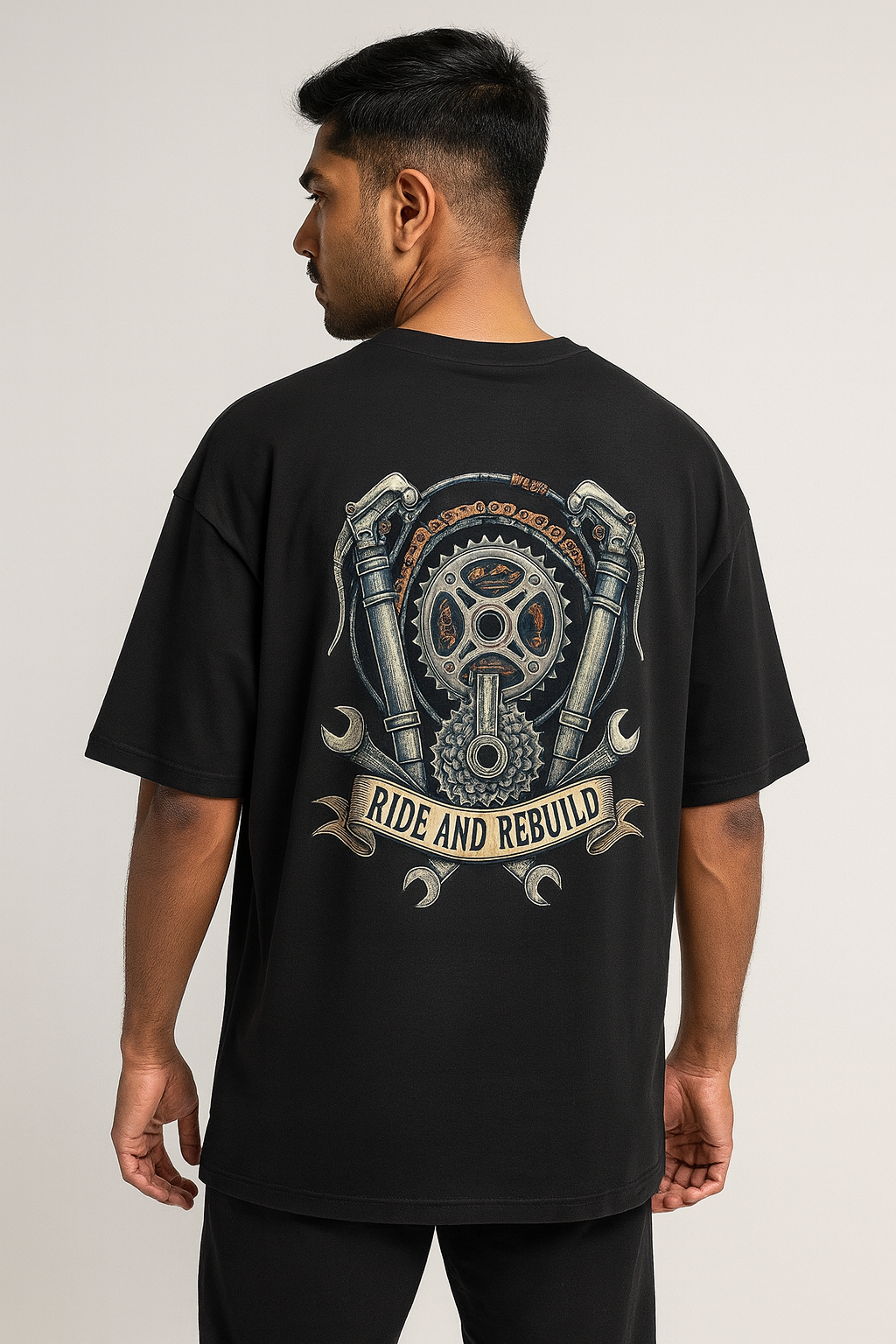 Oversized black rider tee with engine artwork